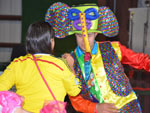 Quillama Folkloric Group dancer with a woman from the audience